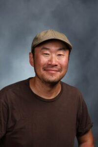 Yearbook Style Photo of Leo Park Smiling