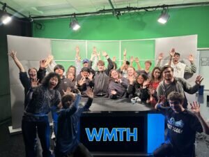 WMTH Students Cheering In Front Of New Broadcasting Gear